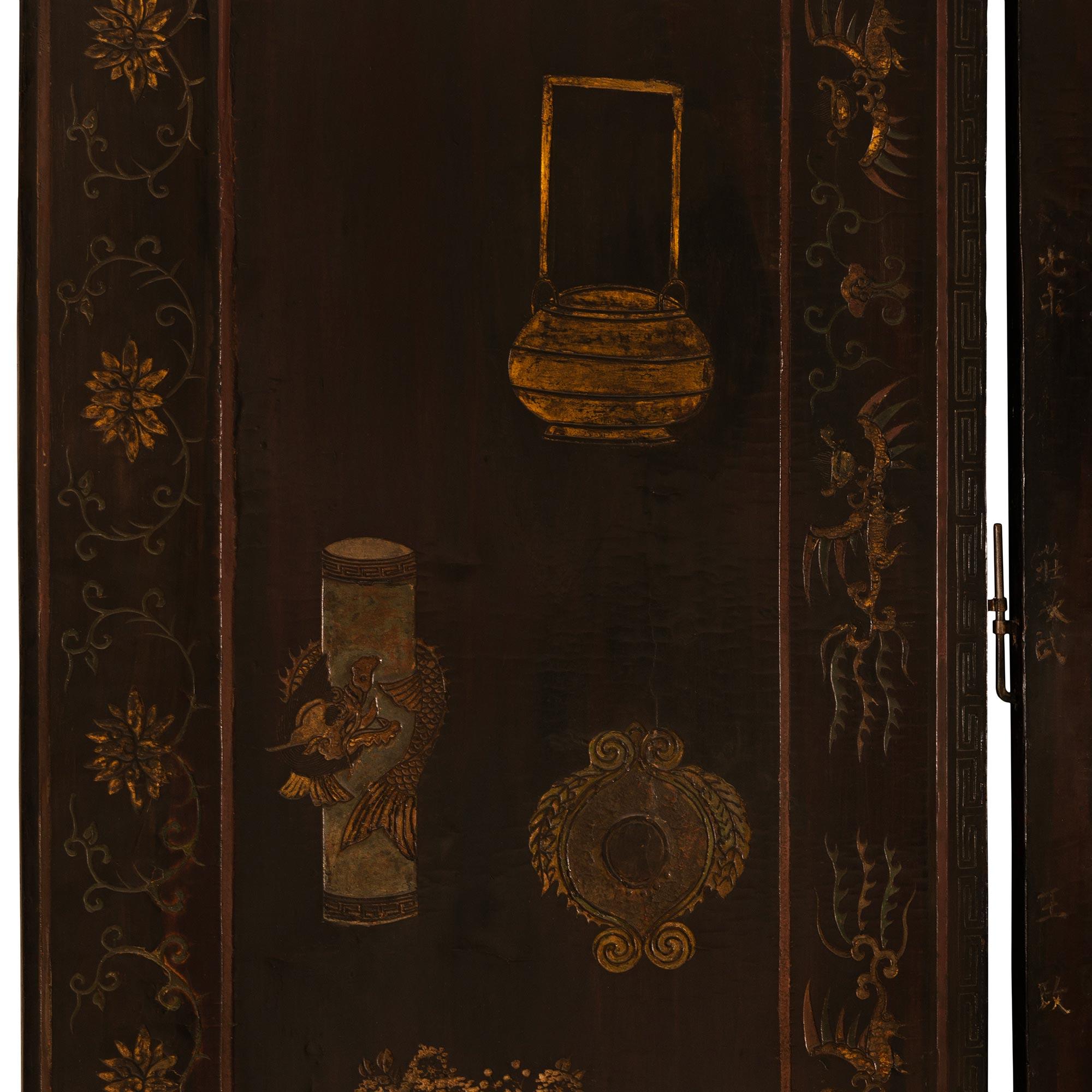 A Chinese mid 18th century Laquered Coromandel screen For Sale 1
