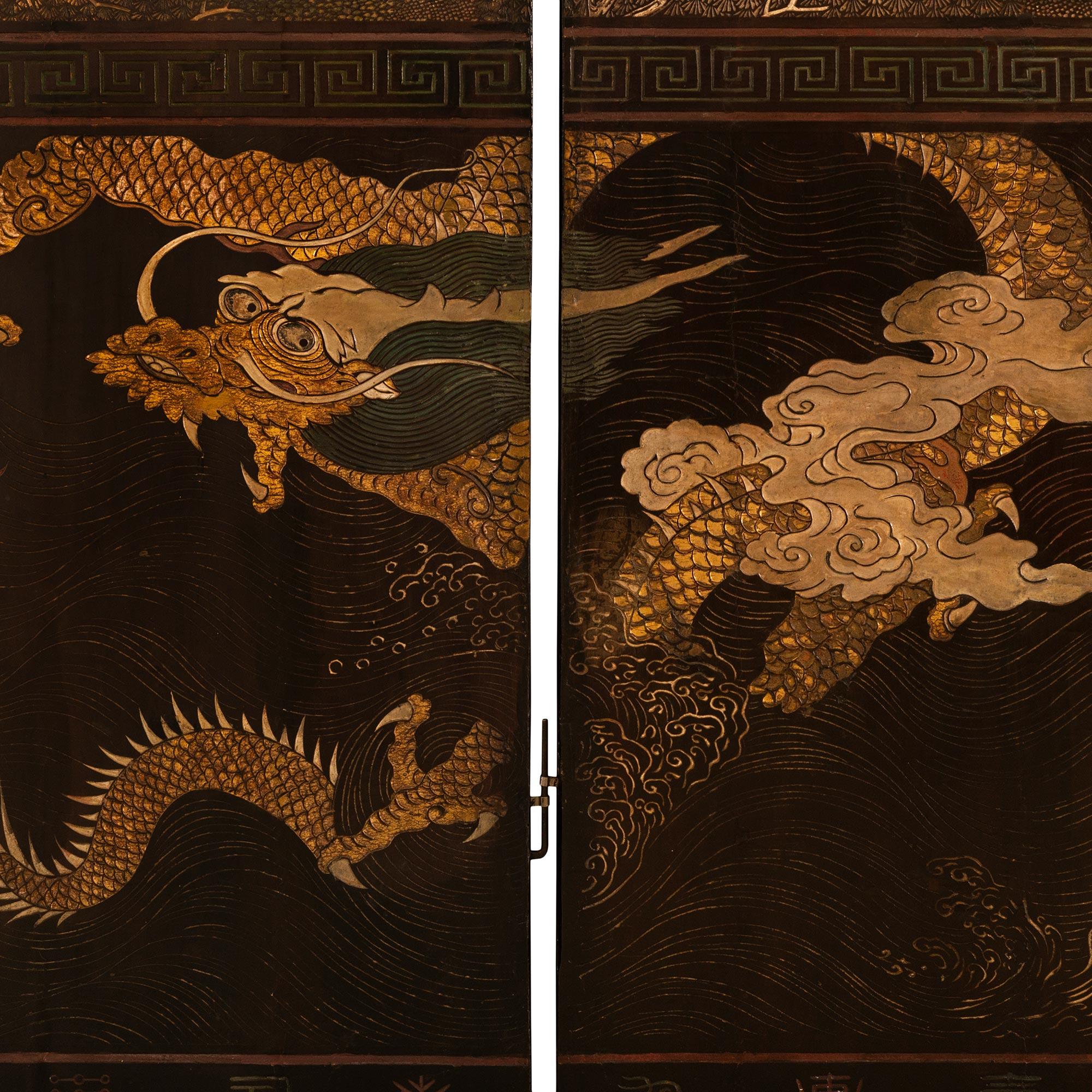 A Chinese mid 18th century Laquered Coromandel screen For Sale 3
