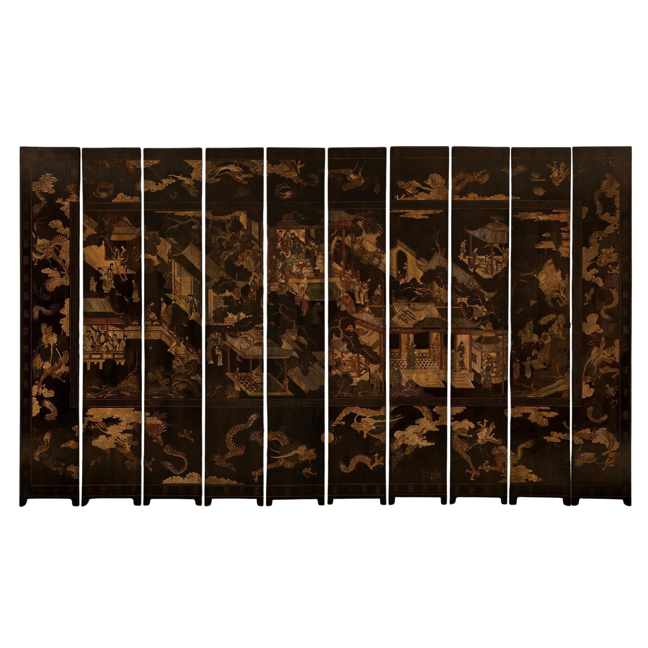 A Chinese mid 18th century Laquered Coromandel screen