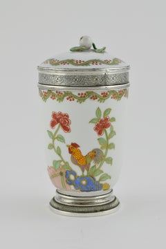 A Chinese porcelain and silver mounted cup and cover