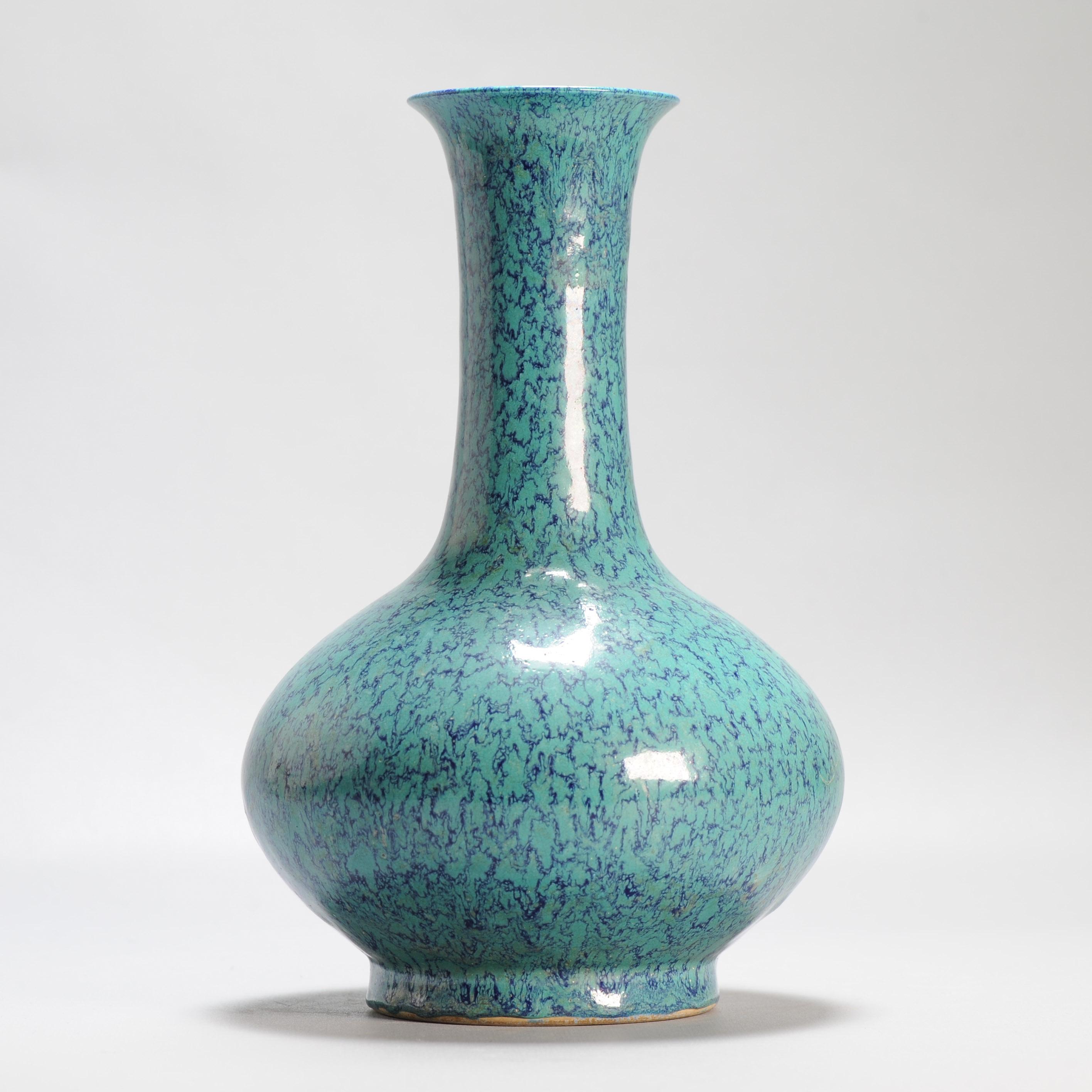 A Chinese Robins Egg bottle vase 20/21c with Seal Mark in Qianlong style 1