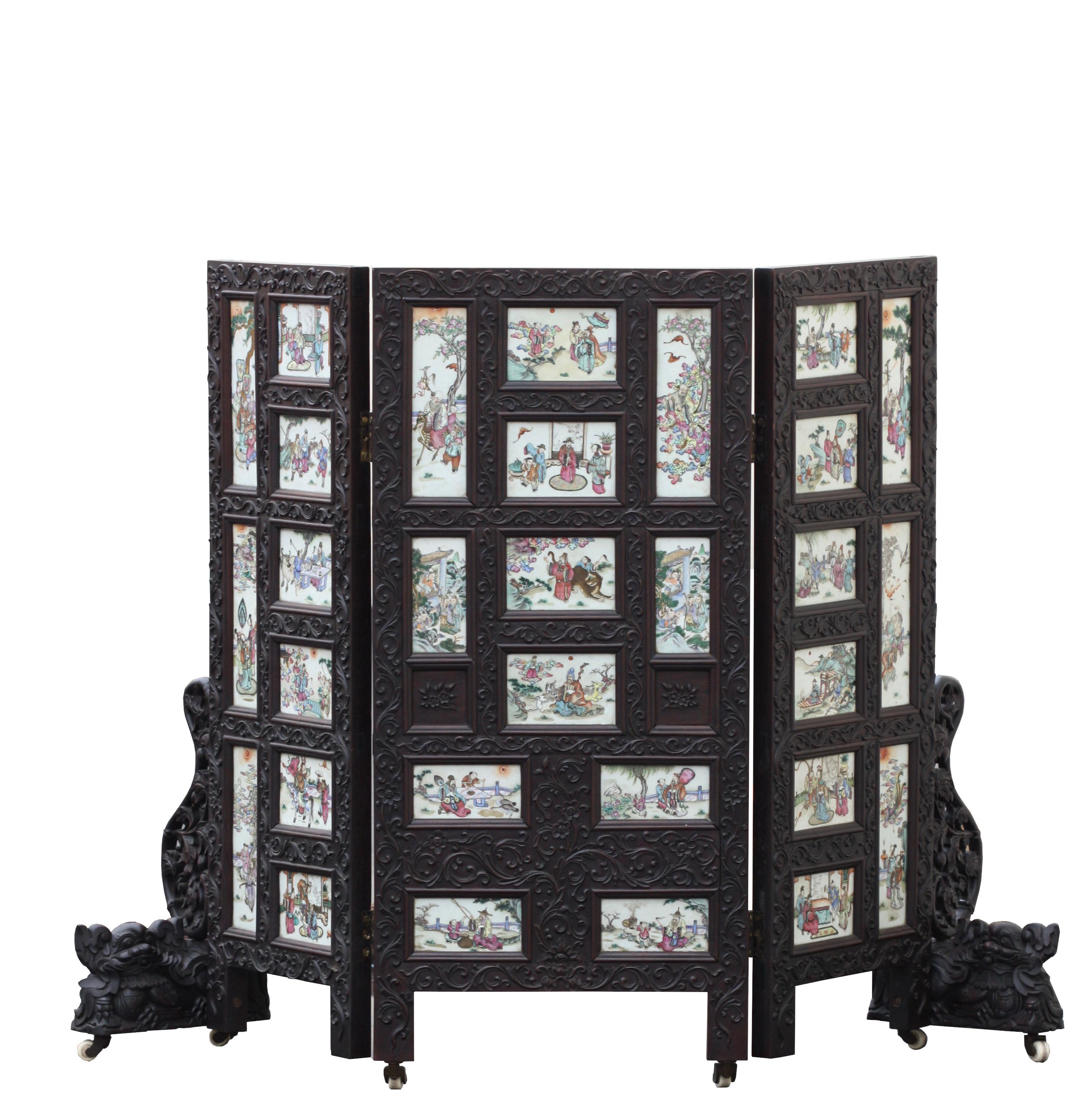 A Chinese three-panel porcelain inlaid and mixed wood screen
The frame mounted with thirty famille-rose panels painted with various figures, animals and auspicious objects
Measures: Height 41.25 in. x width 58 in.
(104.7 x 147 cm.)
  