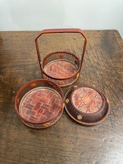 A Chinese Two-Tiered Bamboo and Rattan Lidded Dessert Basket with Handle