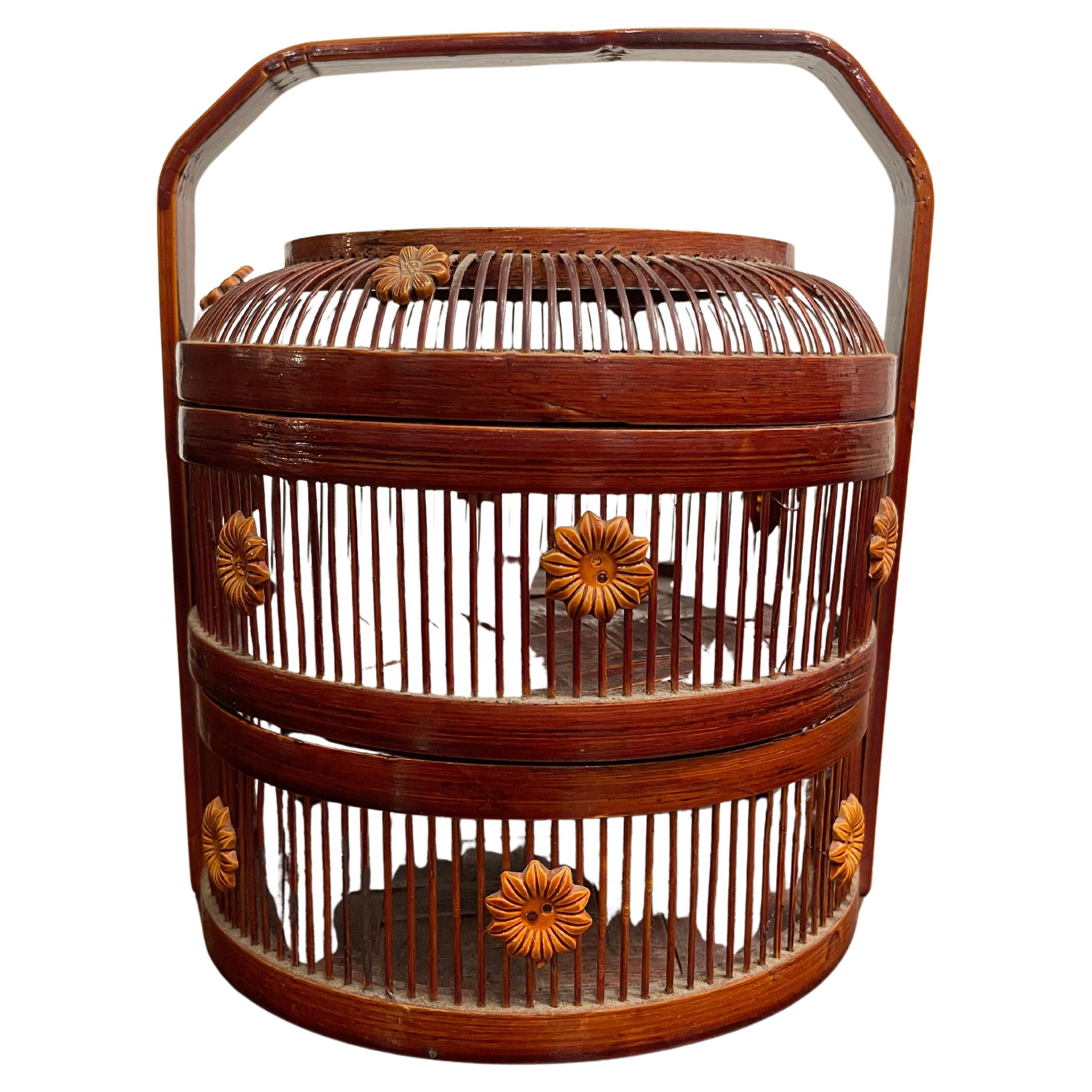 A Chinese Two-Tiered Bamboo and Rattan Lidded Dessert Basket with Handle