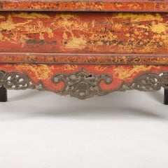 A Chinoiserie red lacquered wardrobe, 19th C.