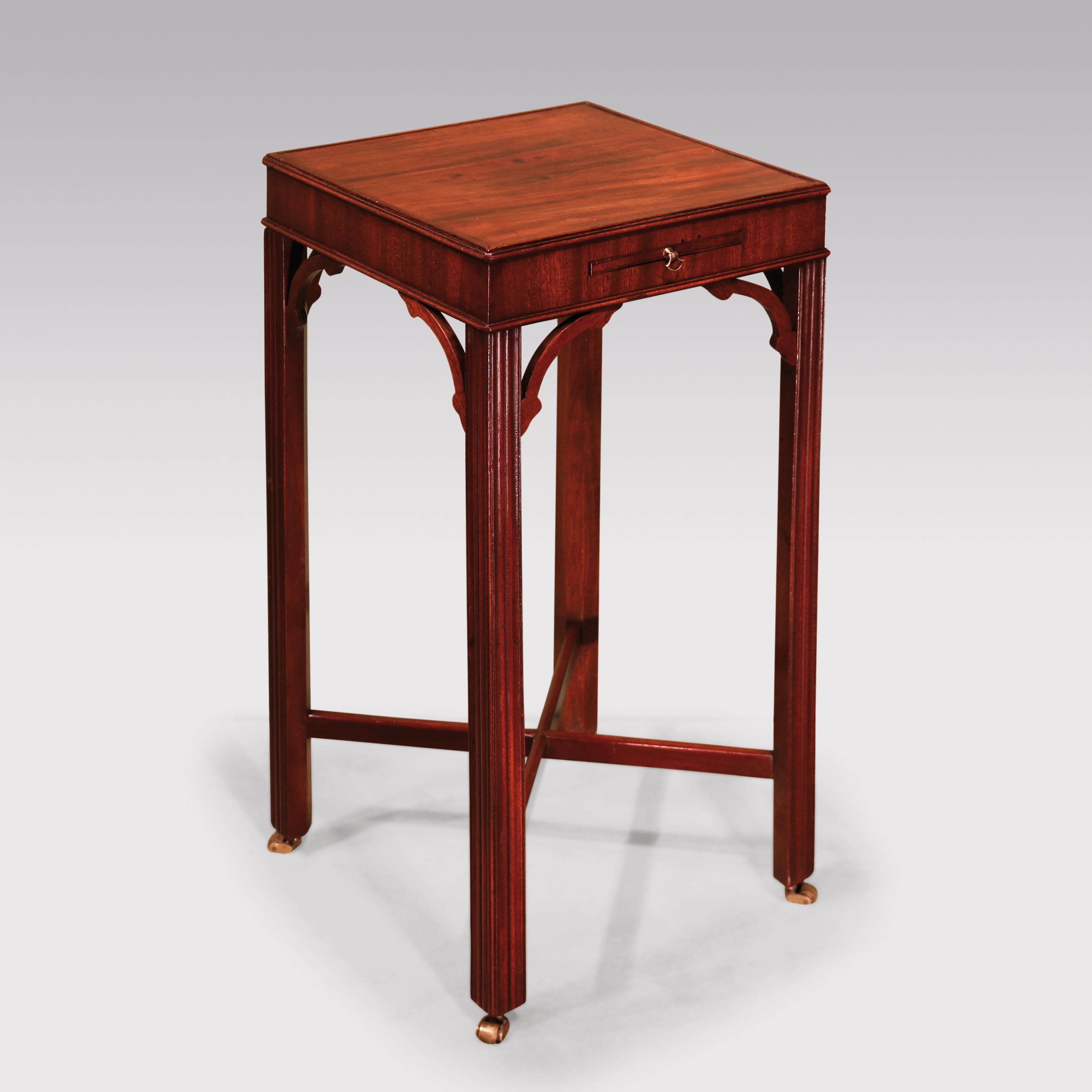 Mid 18th century George III period mahogany Kettle Stand, having square moulded edged top above frieze with slide, supported on moulded chamfered legs with Gothic scroll corner brackets & cross stretchers retaining original brass castors.