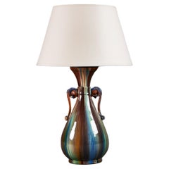 A Christopher Dresser Drip Glaze Vase as a Lamp