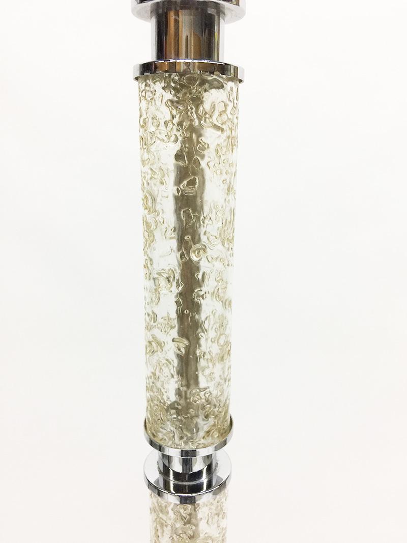 A chrome and crystal glass floor lamp, 1950s

With 7 crystal glass tubes of each 17 cm high between the chrome
Unknown maker, 1950-1960
The height of the lamp is 1.60 cm
The diagonal of the base of the lamp is 22 cm
The weight is 6 kilos.
  
