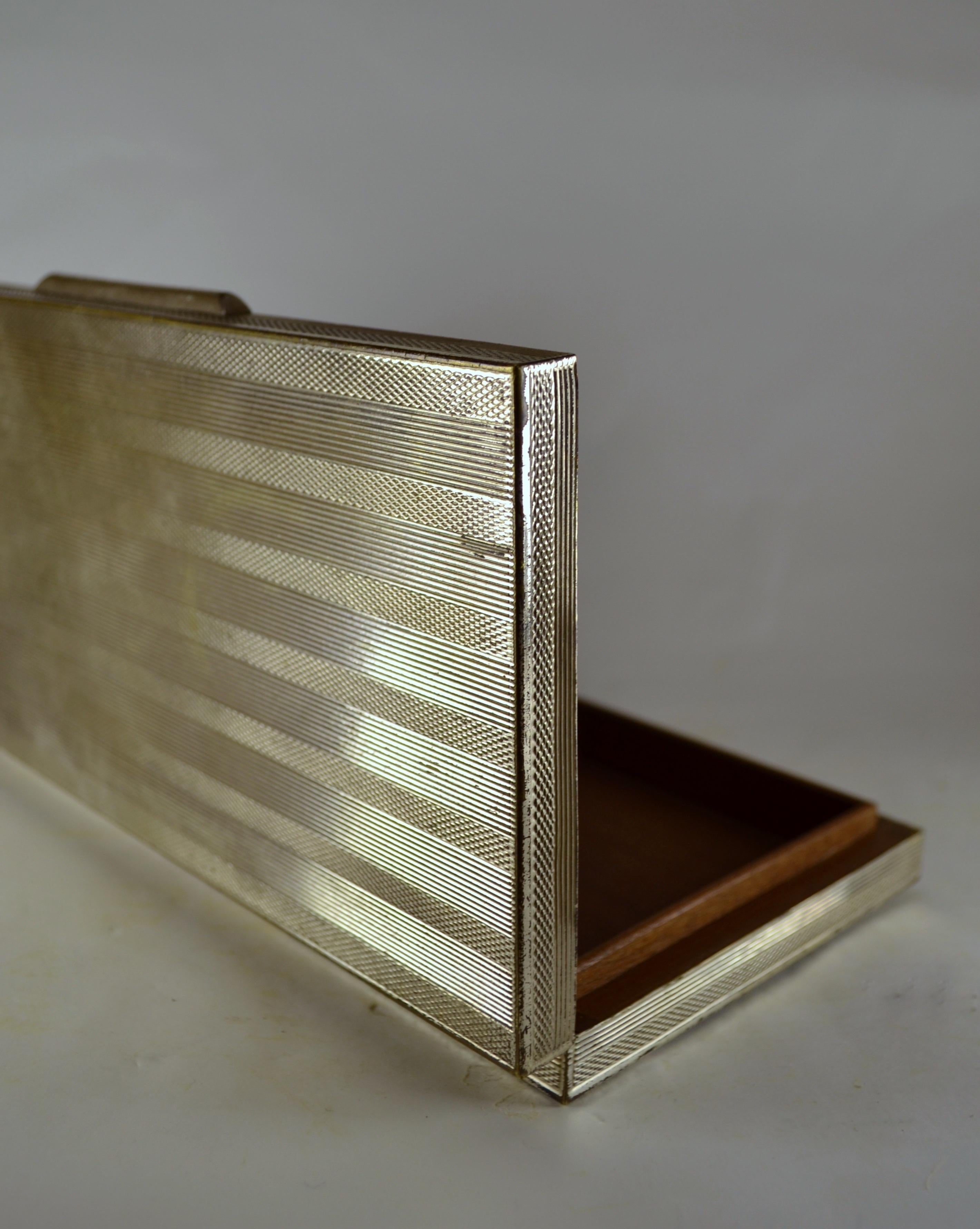 Hollywood Regency A cigar or cigarette box silver-plated metal and exotic wood France 1970 For Sale