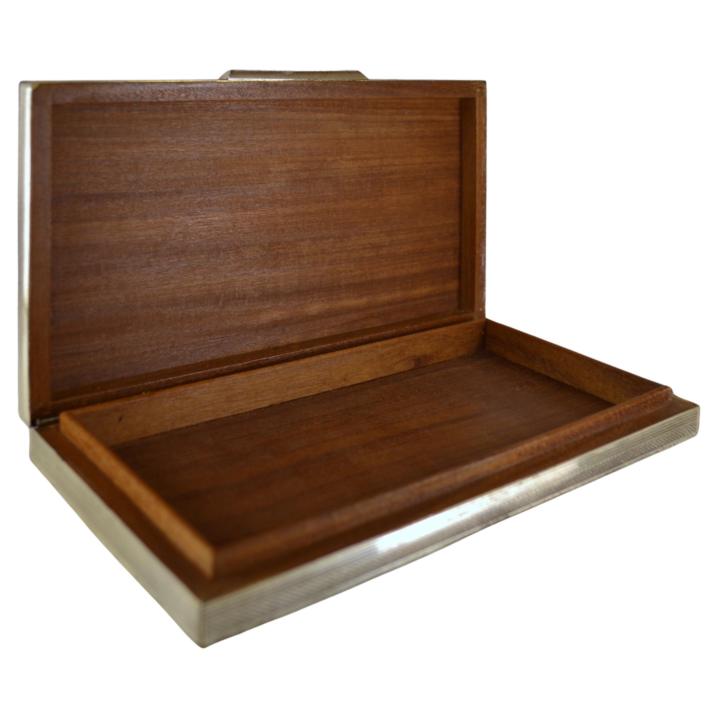 A cigar or cigarette box silver-plated metal and exotic wood France 1970