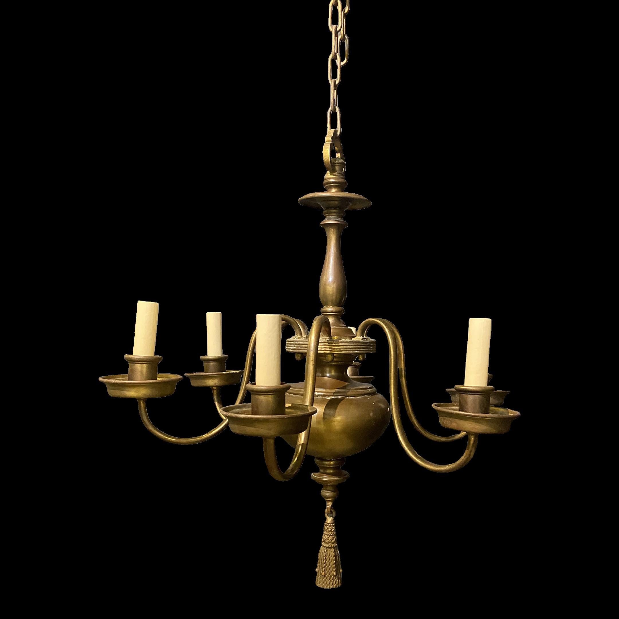 A circa 1910's brown patinated bronze chandelier with 6 lights