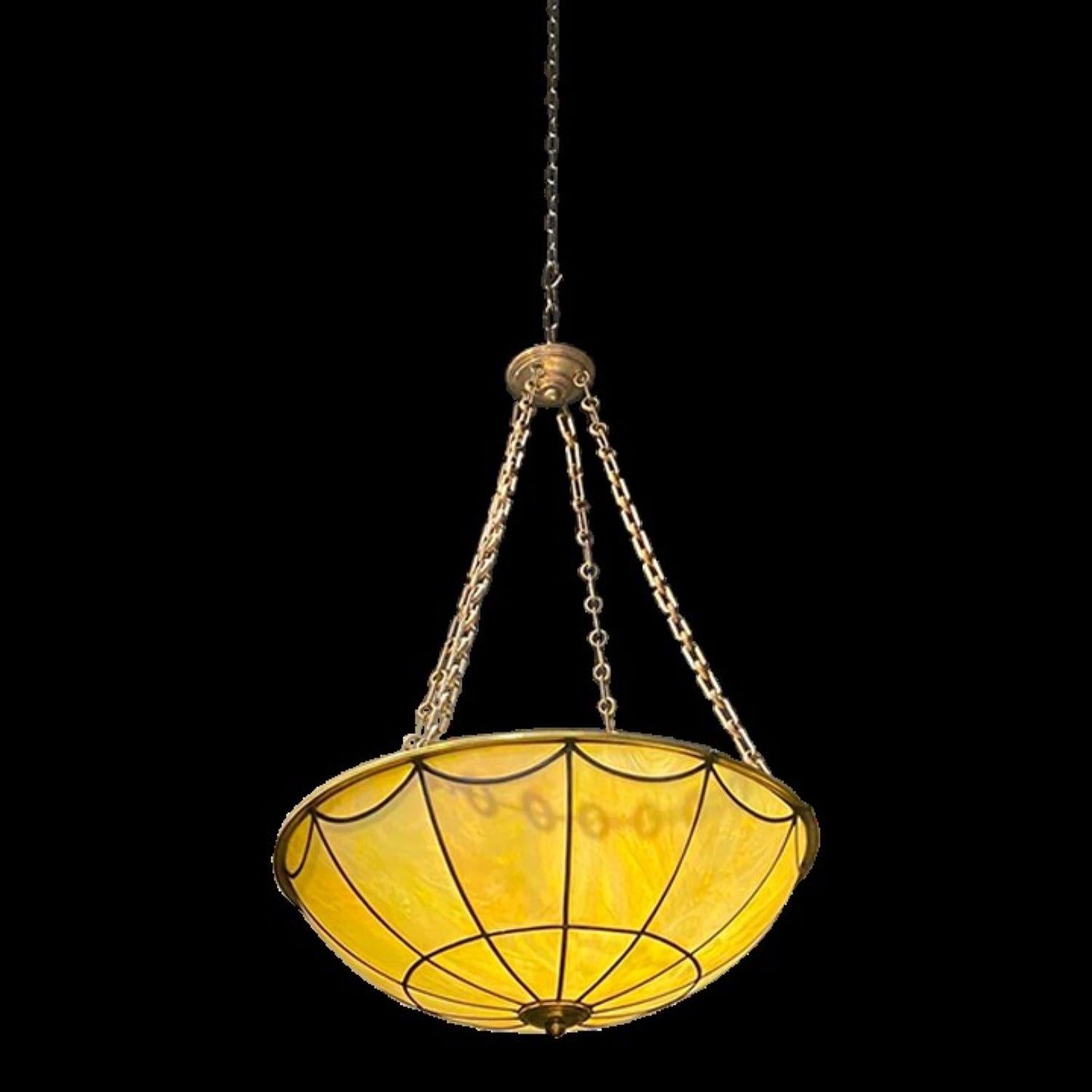 A circa 1920's American leaded glass light fixture with 8 interior lights.