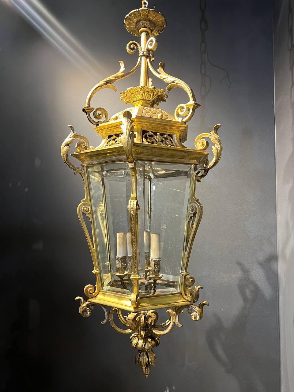 a circa 1920's Caldwell gilt bronze lantern with beveled glass inset