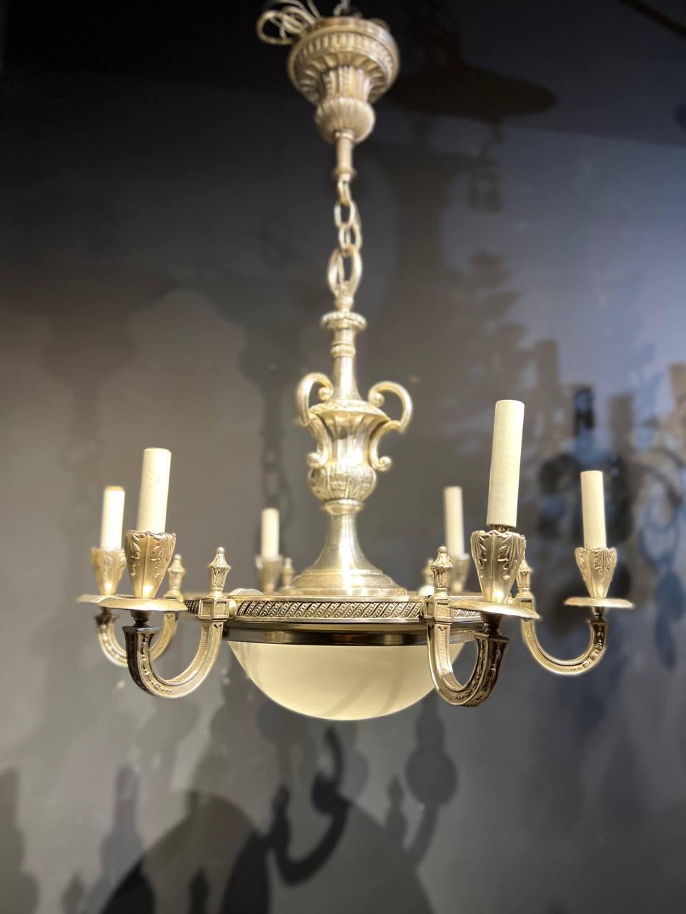 a circa 1920's silver plated light fixture with Opaline glass inset, with 6 lights and 2 interior lights