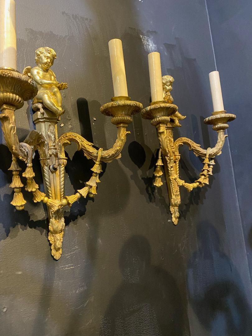 1930's French Gilt Bronze Sconces with Cherubs In Good Condition For Sale In New York, NY