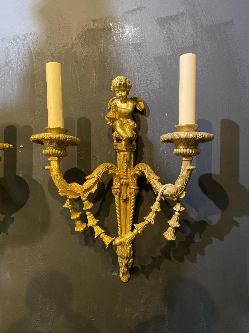 Early 20th Century 1930's French Gilt Bronze Sconces with Cherubs For Sale