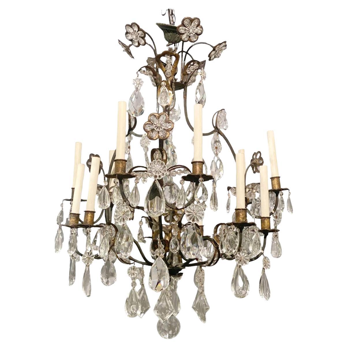 1930's French Gilt Metal and Crystal Chandelier with 12 lights For Sale