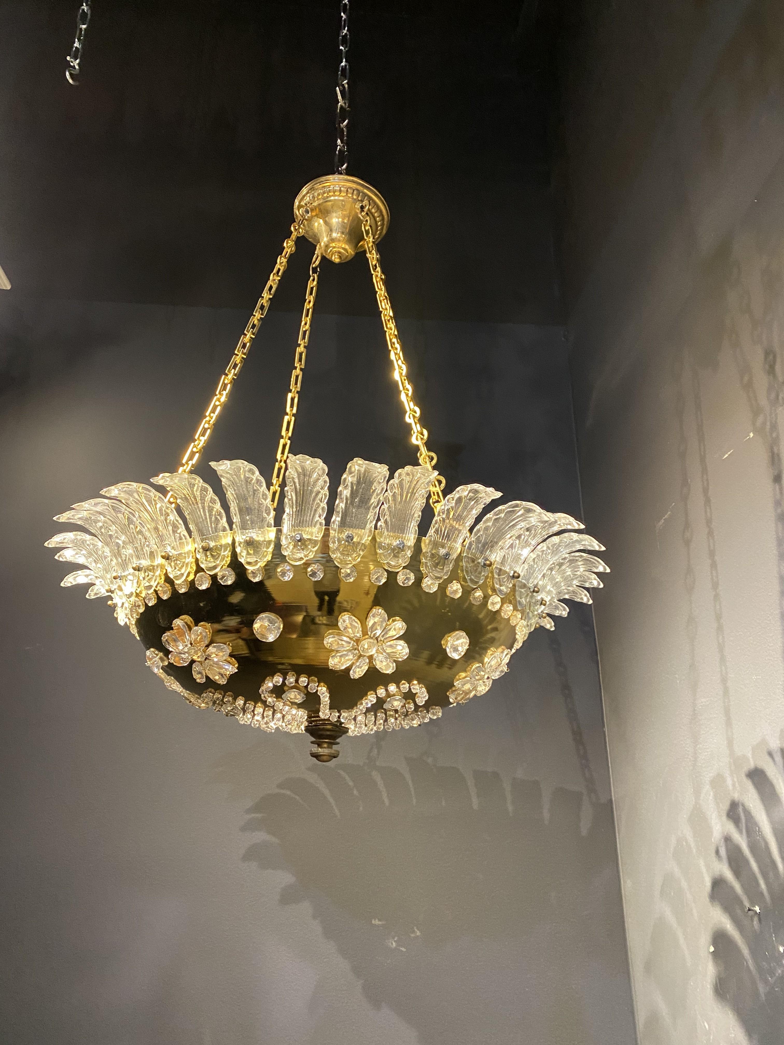 A circa 1930's French Bagues gilt bronze light fixture with crystals inset.