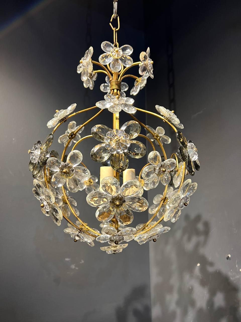 A circa 1930's French Bagues light fixture with clear and black crystal flowers