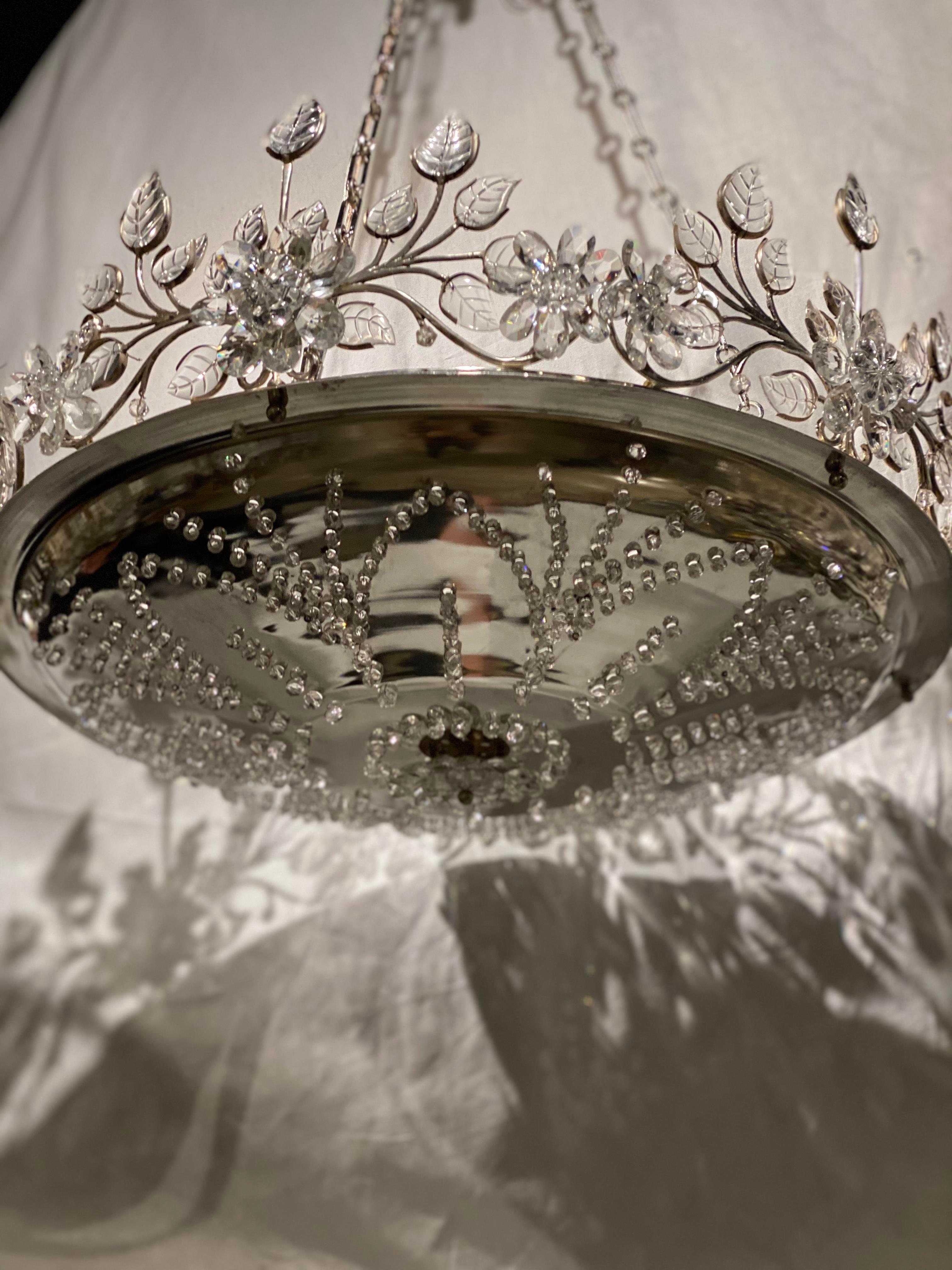 A circa 1930's French silver plated light fixture with 8 interior lights and glass leaves and flowers 