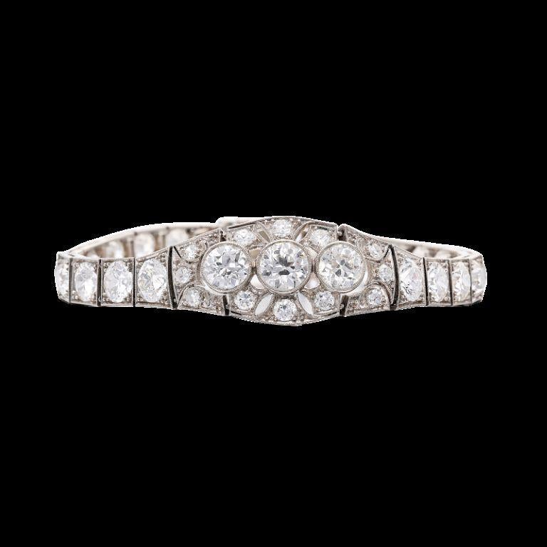 Featuring 41 diamonds.
- Diamonds weighing a total of approximately 10.50 carats
- Platinum and 14 karat white gold
- Length 6 inches
- Total weight 18.51 grams