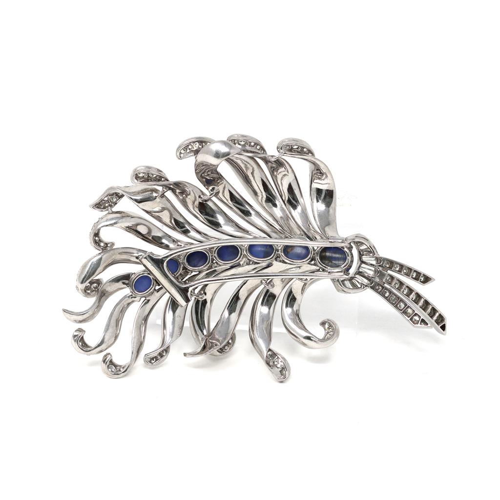 Mixed Cut Star Sapphires and Diamonds Platinum Feather Brooch, circa 1950