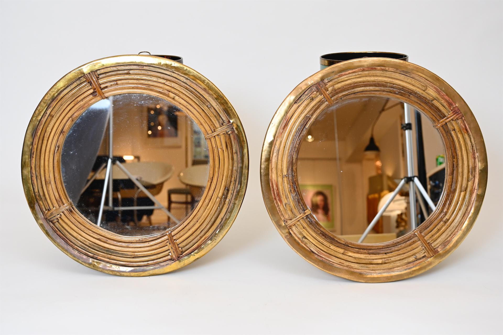 Pair of decorative mirrors in rattan and brass in the style of Gabriella Crespi.

  