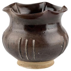 A Cizhou Blackish Brown Glazed Stoneware Foliate Jar, Northern Song Dynasty