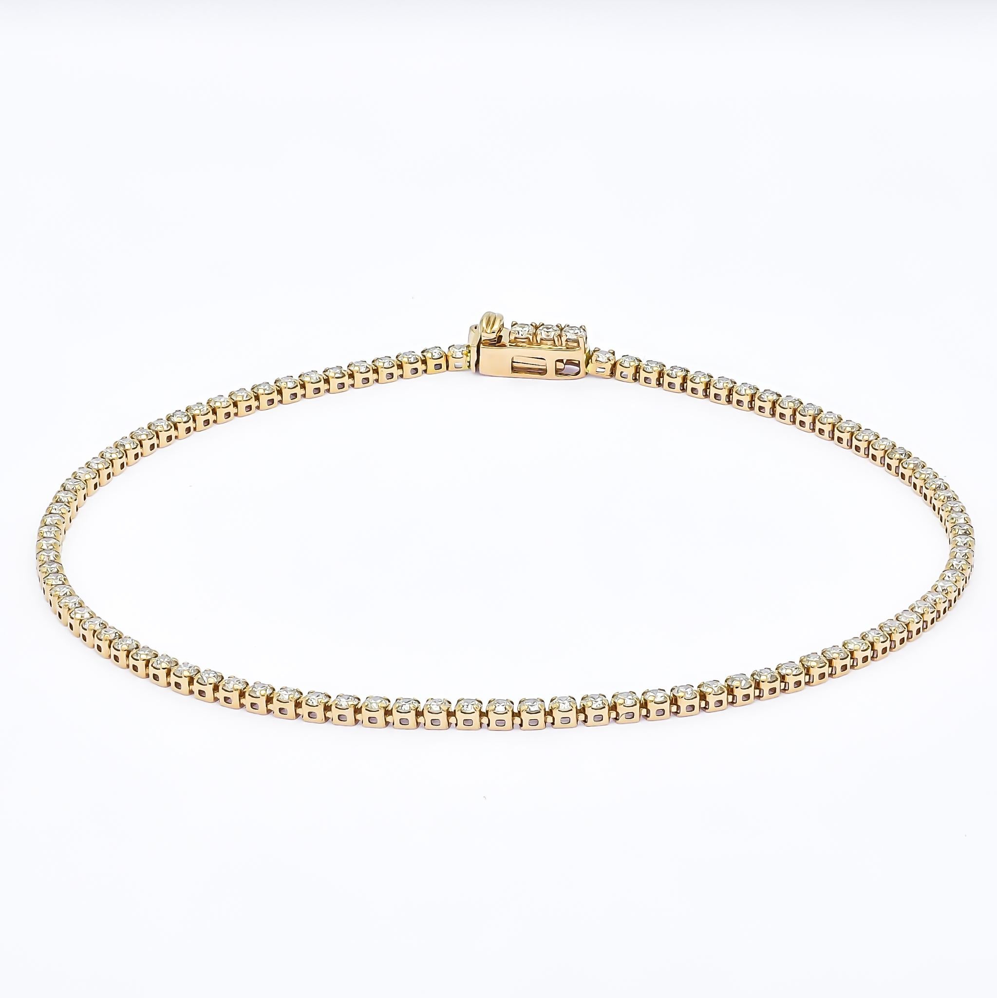 Indulge in the timeless allure of this classic 1.50 carat four-prong tennis bracelet. Meticulously crafted in 18K white gold, it embodies elegance and sophistication. Each natural diamond, meticulously selected for its exceptional quality, is