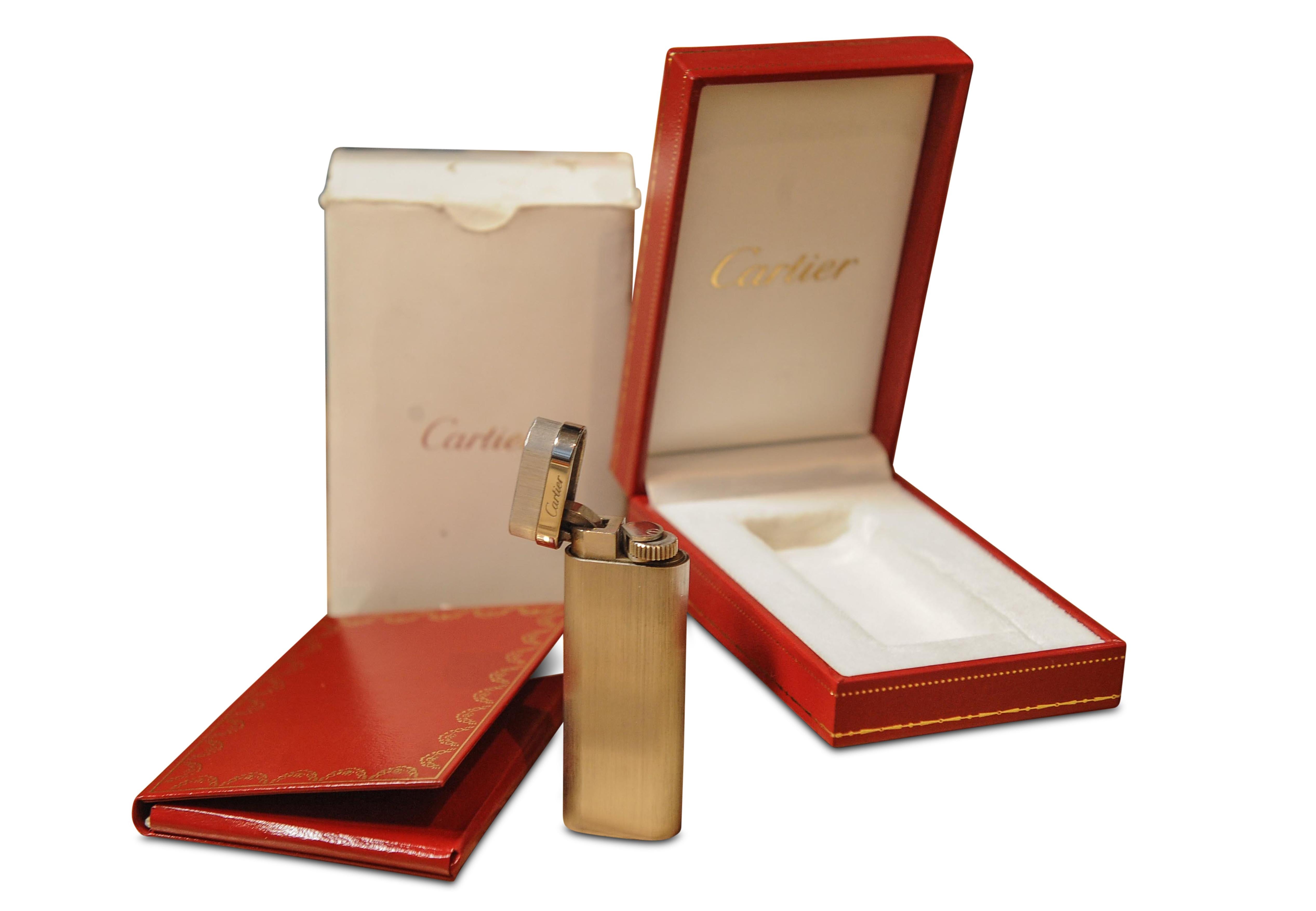 A Classic And Elegant Cartier Briquet Standard Steel Satin Finish Cigarette Lighter With Original Cartier Box Made in Switzerland

Serial number N10009

Purchased 25/9/00
Original receipts and paperwork Burrells Family Jewellers Since 1967

