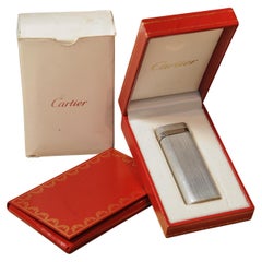 A Classic Cartier Briquet Cigarette Lighter With Original Cartier Box