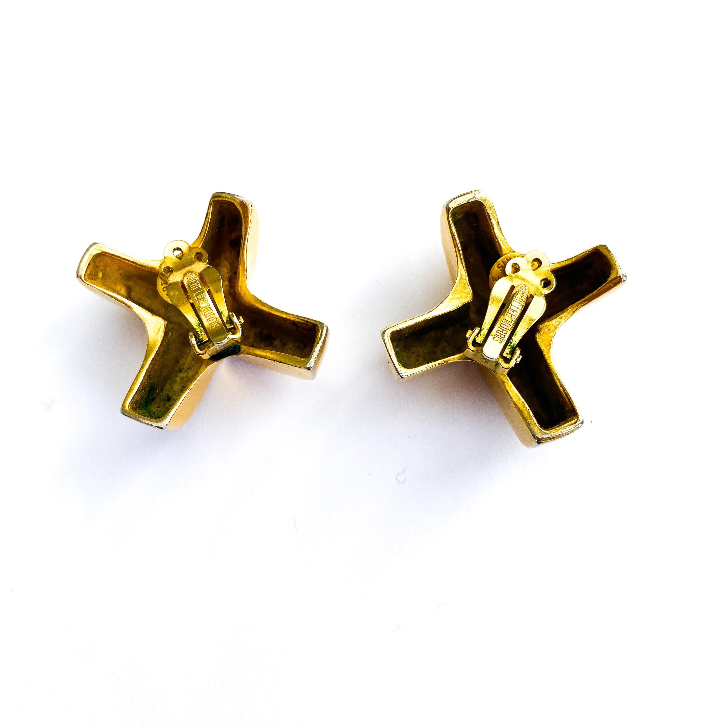 Women's or Men's A classic pair of gilt 'cross motif' earrings, Robert Lee Morris, USA, 1980s For Sale