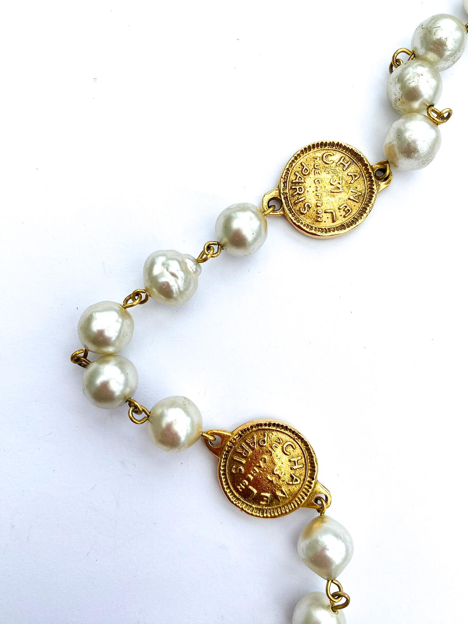 A classic rope of baroque pearls, with medallions/coins, Chanel, Paris 1980s. For Sale 6