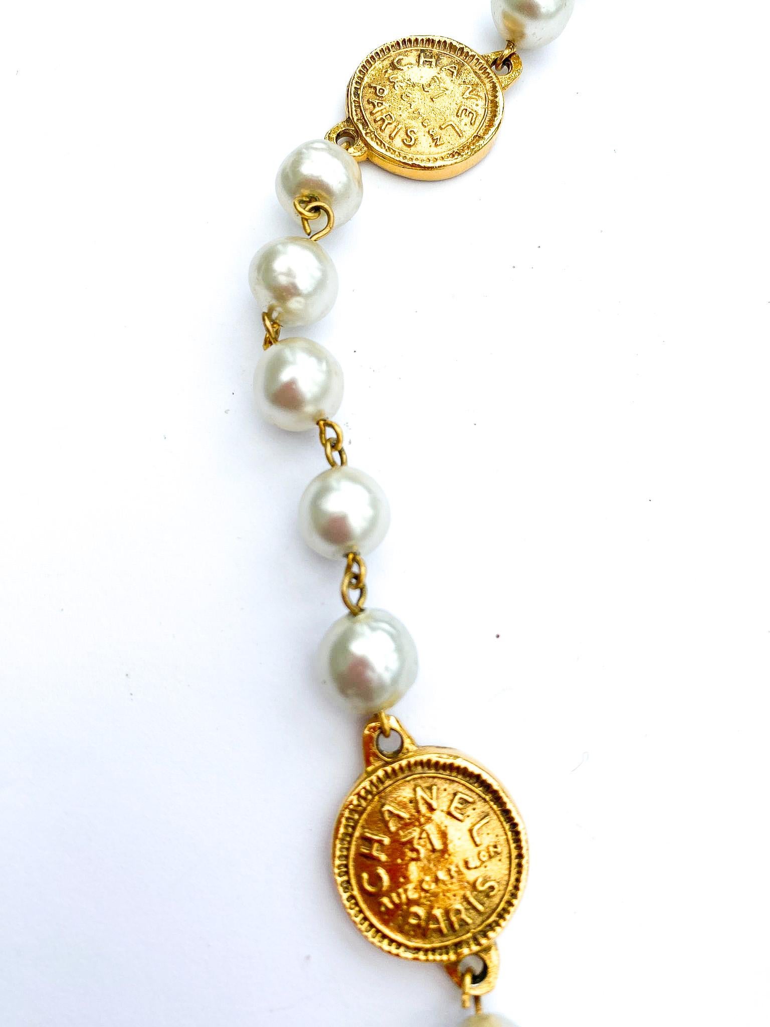 A classic rope of baroque pearls, with medallions/coins, Chanel, Paris 1980s. For Sale 1