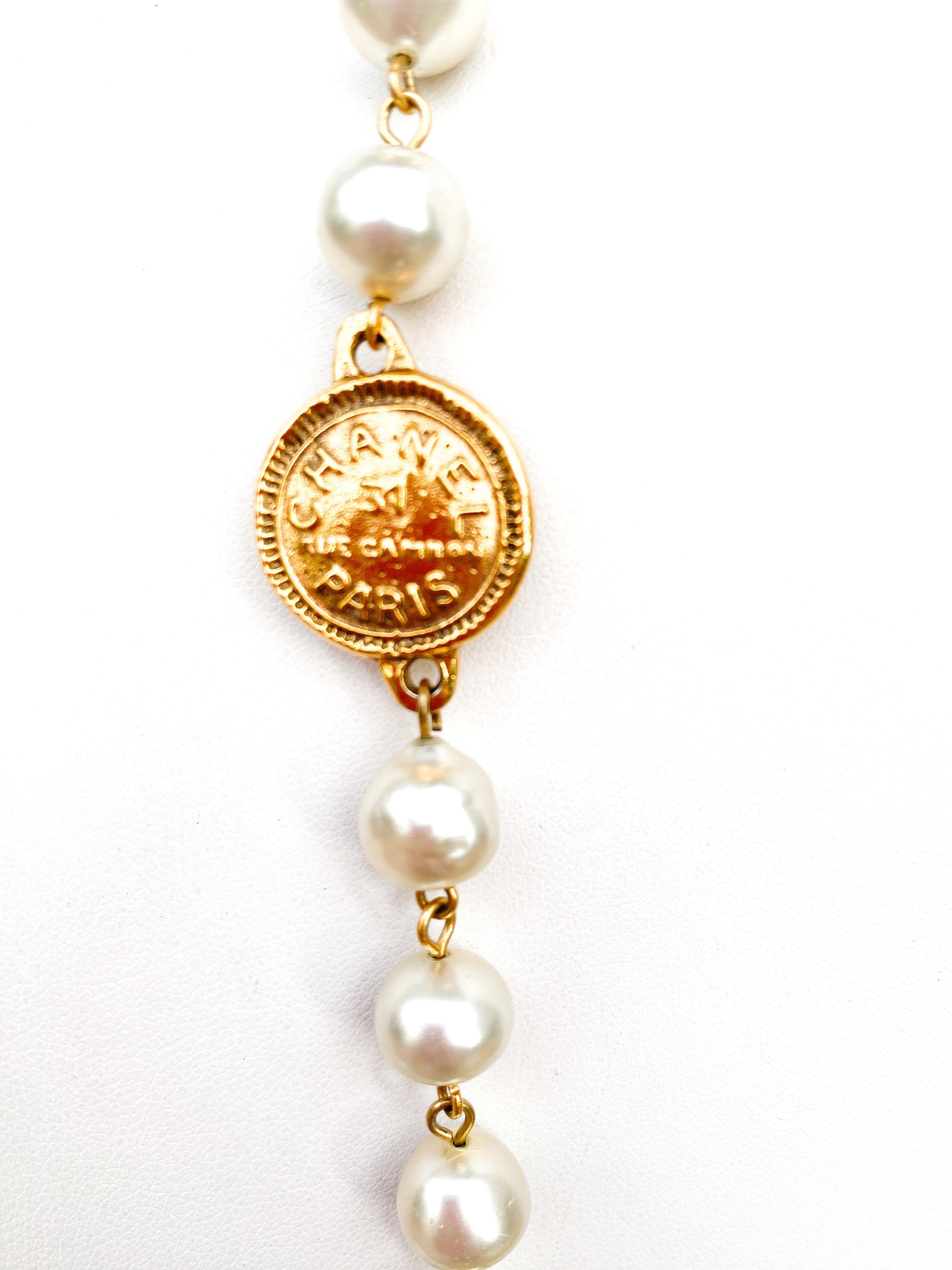 A classic rope of baroque pearls, with medallions/coins, Chanel, Paris 1980s. For Sale 2