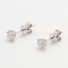 A Classic Shimansky Diamonds Studs Solitaire  Earring in 18K White Gold