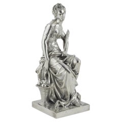 A classical silver plated female figure 