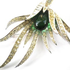 A clear and emerald paste large 'spray' brooch, Marcel Boucher, USA, 1960s