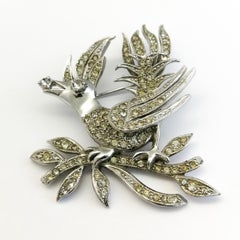 A clear paste 'bird with diamond' brooch, Christian Dior by Mitchel Maer, 1950s