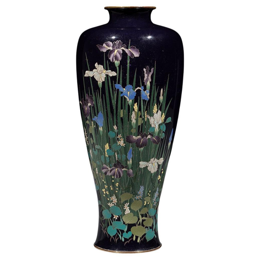 A cloisonné vase with a composition of irises and aquatic plants