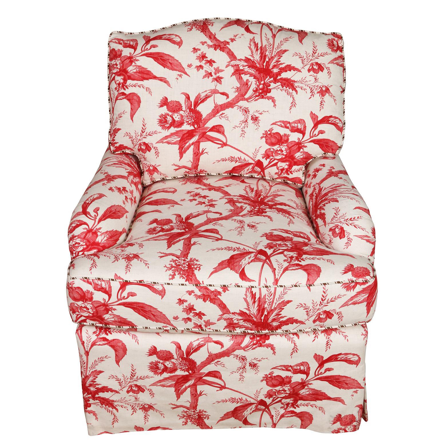 A comfortable and gracious club chair with loose back and  seat cushions, rolled arms and a tailored pleated  skirt.  Upholstered in a stunning  red  and white Lisa Fine Textiles linen with an unexpected brown and white contrasting welt.  Very  well