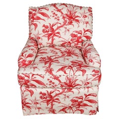 A Club Chair in a Red and White Lisa Fine Textile Linen