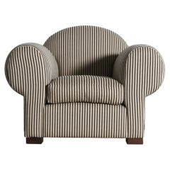 A Clubsessel, gepolstert mit gestreiftem Stoff