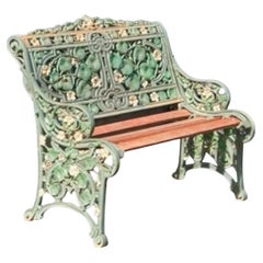 A Coalbrookdale cast iron garden bench
