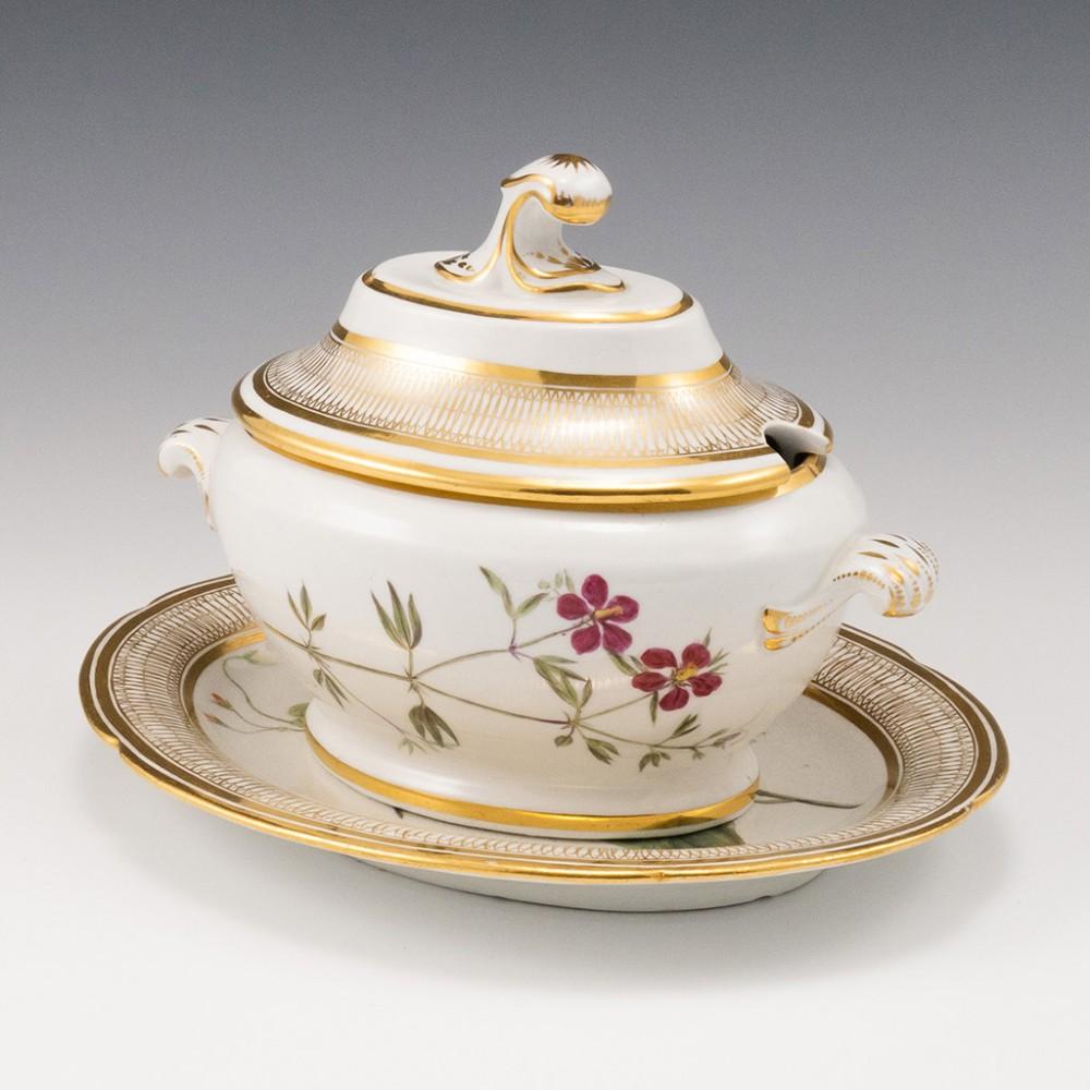 A Coalport Botanical Porcelain Dessert Tureen Cover and Stand, 1805-10

Additional information:
Date : 1805-1810
Period : George III
Marks : None
Origin : Coalport, Shropshire
Colour : Polychrome and Gilt
Pattern : Botanical specimens and elaborate