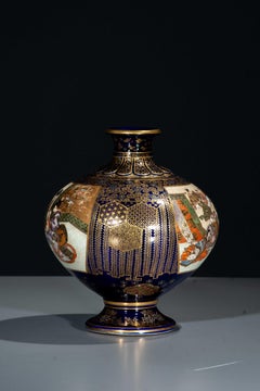 A cobalt-blue Satsuma vase depicting courtly scenes, signed Kinkozan