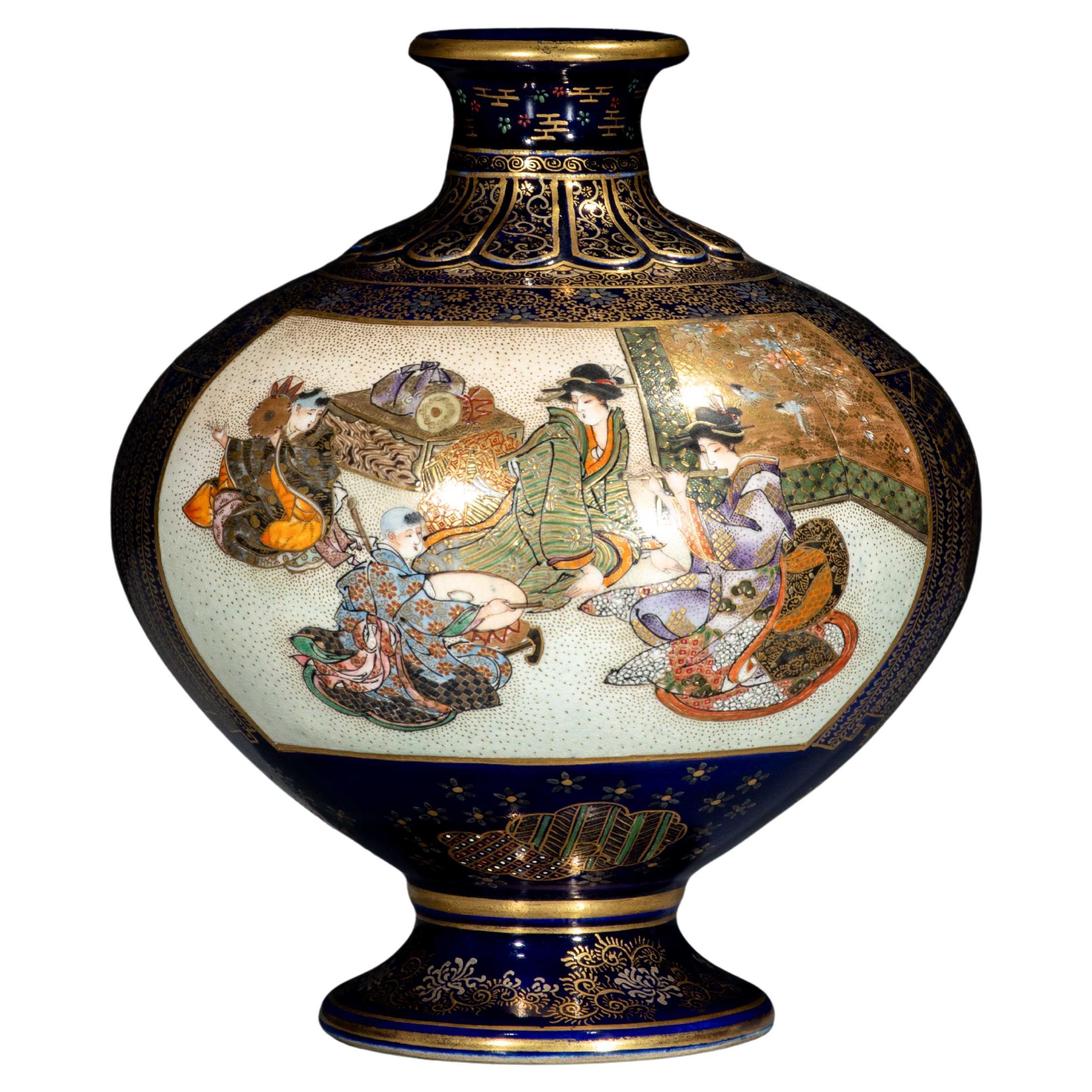A cobalt-blue Satsuma vase depicting courtly scenes, signed Kinkozan