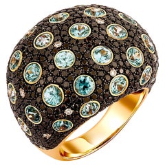 A Cocktail Ring of Black Diamonds & Blue Zircon