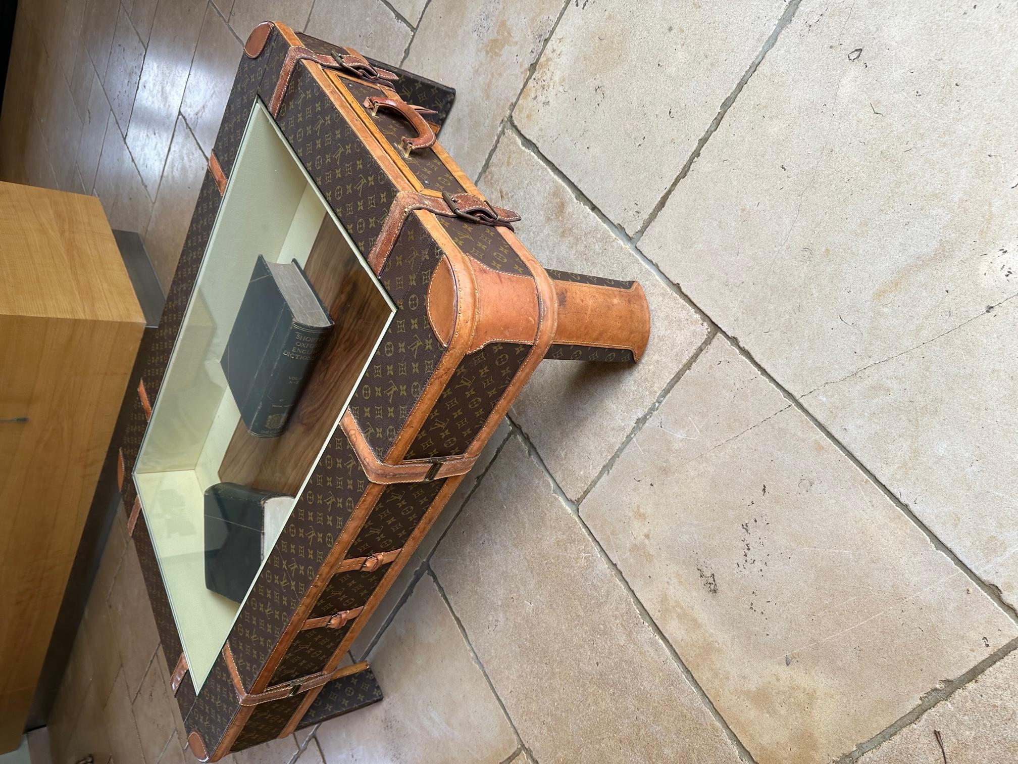 A coffee table made from vintage Louis Vuitton luggage In Good Condition For Sale In London, GB