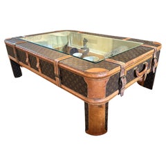 A coffee table made from Retro Louis Vuitton luggage